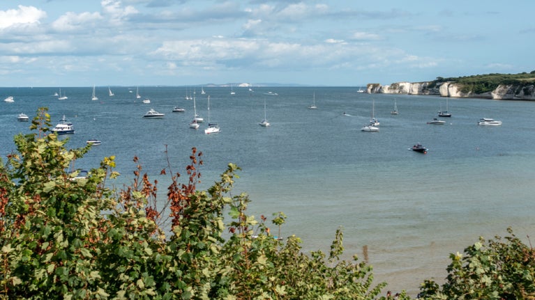 Boats in front of Old Harry Rocks, Studland Bay, Dorset
